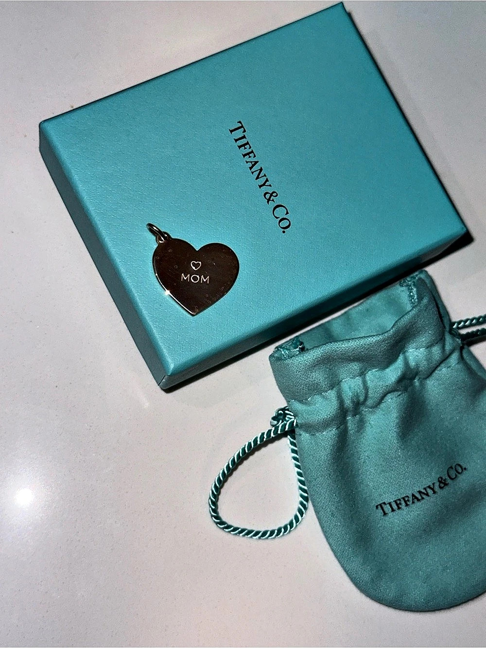 Tiffany & Co. Silver Love Mom Heart Tag Charm.